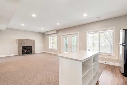 335 Morningside Crescent Sw, Airdrie, AB - Indoor With Fireplace