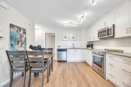 314 Cranbrook Square Se, Calgary, AB - Indoor Photo Showing Kitchen With Upgraded Kitchen