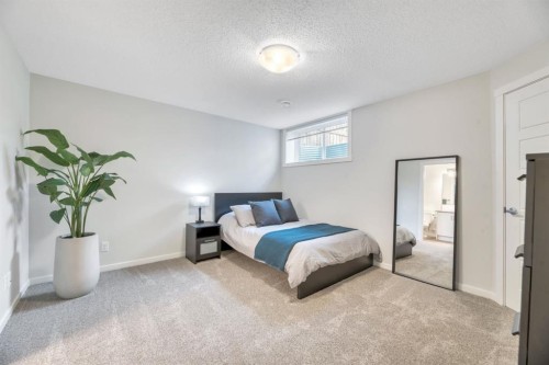 314 Cranbrook Square Se, Calgary, AB - Indoor Photo Showing Bedroom