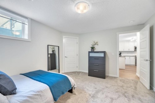 314 Cranbrook Square Se, Calgary, AB - Indoor Photo Showing Bedroom