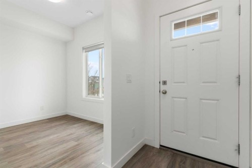 1701-24 Rivercrest Drive, Cochrane, AB - Indoor Photo Showing Other Room