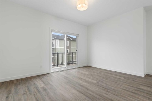 1701-24 Rivercrest Drive, Cochrane, AB - Indoor Photo Showing Other Room