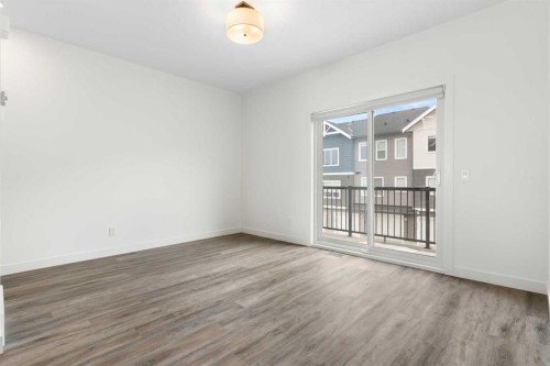 1701-24 Rivercrest Drive, Cochrane, AB - Indoor Photo Showing Other Room
