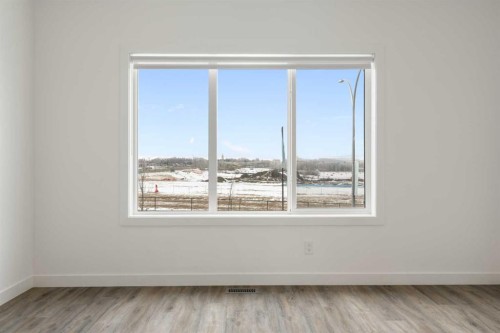 1701-24 Rivercrest Drive, Cochrane, AB - Indoor Photo Showing Other Room