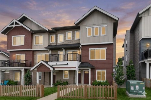 1701-24 Rivercrest Drive, Cochrane, AB - Outdoor With Facade