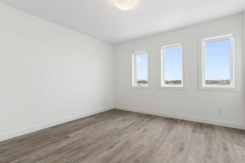 1701-24 Rivercrest Drive, Cochrane, AB - Indoor Photo Showing Other Room