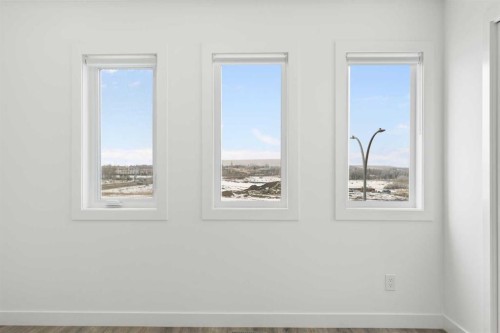 1701-24 Rivercrest Drive, Cochrane, AB - Indoor Photo Showing Other Room
