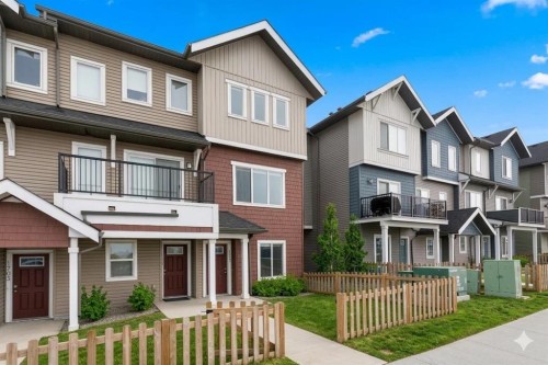 1701-24 Rivercrest Drive, Cochrane, AB - Outdoor With Facade