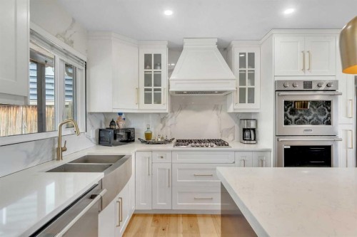 272 West Chestermere Drive, Chestermere, AB - Indoor Photo Showing Kitchen With Double Sink With Upgraded Kitchen