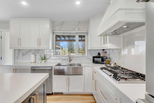 272 West Chestermere Drive, Chestermere, AB - Indoor Photo Showing Kitchen With Double Sink With Upgraded Kitchen