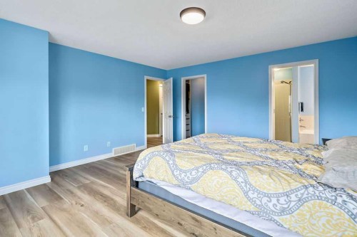 158 New Brighton Lane Se, Calgary, AB - Indoor Photo Showing Bedroom