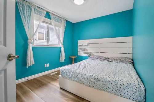 158 New Brighton Lane Se, Calgary, AB - Indoor Photo Showing Bedroom