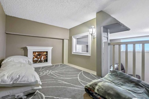 158 New Brighton Lane Se, Calgary, AB - Indoor Photo Showing Bedroom