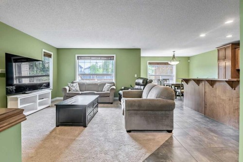 158 New Brighton Lane Se, Calgary, AB - Indoor Photo Showing Living Room