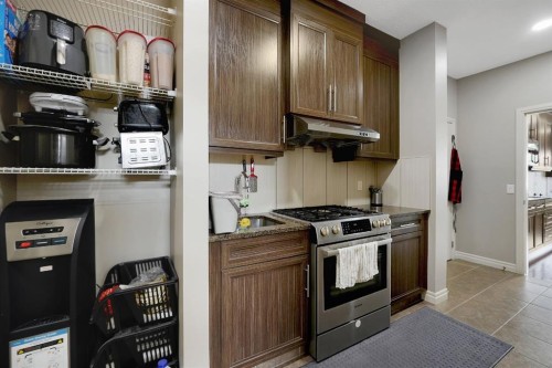 25 Redstone Path Ne, Calgary, AB - Indoor Photo Showing Kitchen