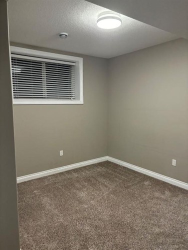 25 Redstone Path Ne, Calgary, AB - Indoor Photo Showing Other Room