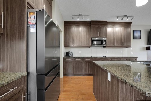 25 Redstone Path Ne, Calgary, AB - Indoor Photo Showing Kitchen With Upgraded Kitchen