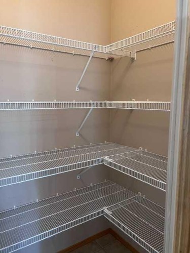A-4813 49 Street West, Olds, AB - Indoor With Storage