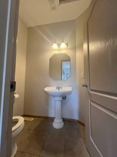 A-4813 49 Street West, Olds, AB - Indoor Photo Showing Bathroom