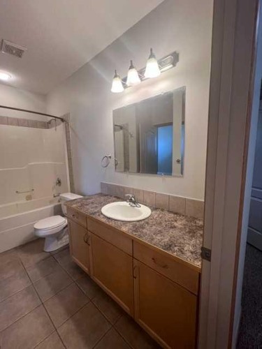A-4813 49 Street West, Olds, AB - Indoor Photo Showing Bathroom