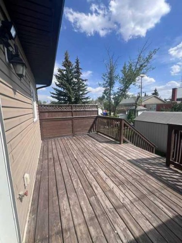 A-4813 49 Street West, Olds, AB - Outdoor With Deck Patio Veranda