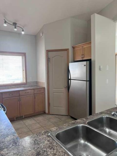 A-4813 49 Street West, Olds, AB - Indoor Photo Showing Kitchen With Double Sink