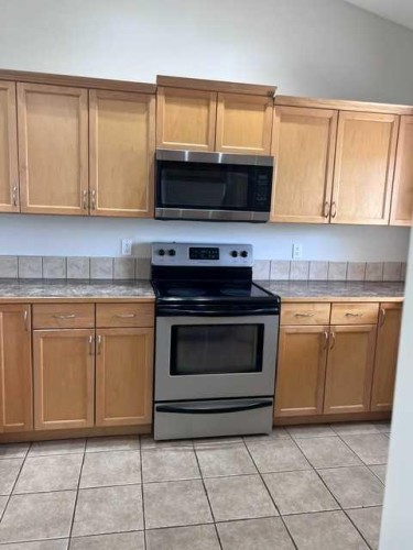 A-4813 49 Street West, Olds, AB - Indoor Photo Showing Kitchen