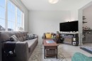 1240 Cornerstone Way Ne, Calgary, AB  - Indoor Photo Showing Living Room 