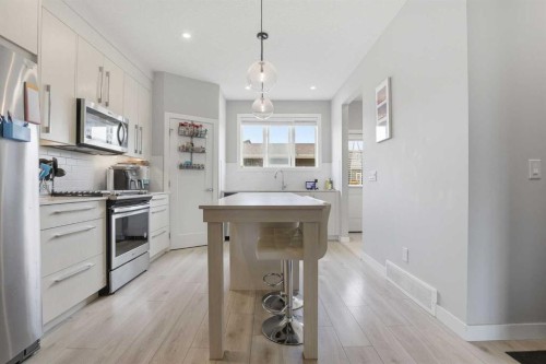 1240 Cornerstone Way Ne, Calgary, AB - Indoor Photo Showing Kitchen With Upgraded Kitchen