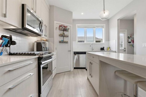 1240 Cornerstone Way Ne, Calgary, AB - Indoor Photo Showing Kitchen With Upgraded Kitchen
