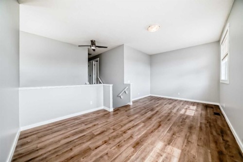 32 Copperleaf Way Se, Calgary, AB - Indoor Photo Showing Other Room