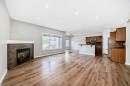 32 Copperleaf Way Se, Calgary, AB  - Indoor With Fireplace 