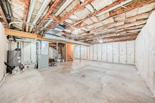 32 Copperleaf Way Se, Calgary, AB - Indoor Photo Showing Basement