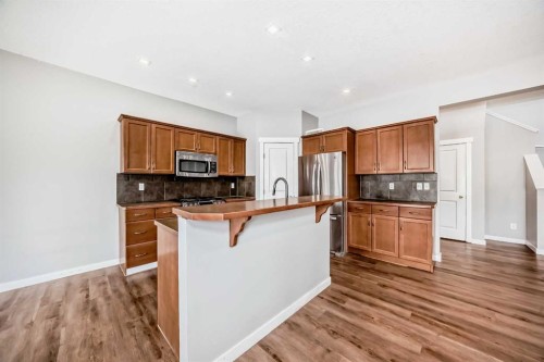 32 Copperleaf Way Se, Calgary, AB - Indoor Photo Showing Kitchen