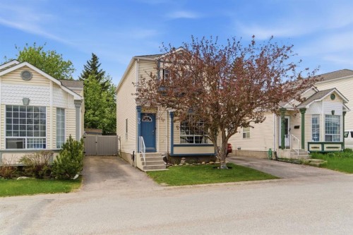 90 Coventry Lane Ne, Calgary, AB - Outdoor With Facade
