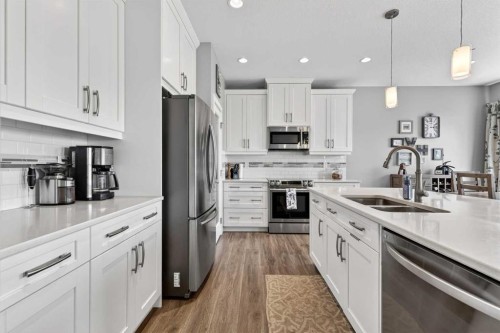 236 Aspenmere Circle, Chestermere, AB - Indoor Photo Showing Kitchen With Double Sink With Upgraded Kitchen