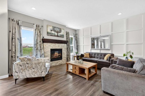 236 Aspenmere Circle, Chestermere, AB - Indoor Photo Showing Living Room With Fireplace