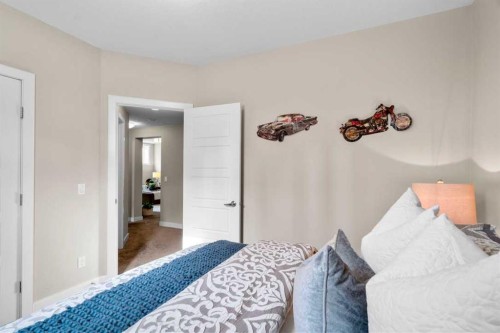 25 Fireside Landing, Cochrane, AB - Indoor Photo Showing Bedroom