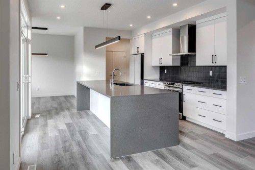 64 Waterford Terrace, Chestermere, AB - Indoor Photo Showing Kitchen With Stainless Steel Kitchen With Upgraded Kitchen