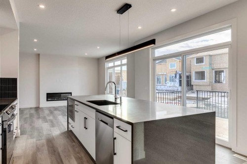 64 Waterford Terrace, Chestermere, AB - Indoor Photo Showing Kitchen With Upgraded Kitchen