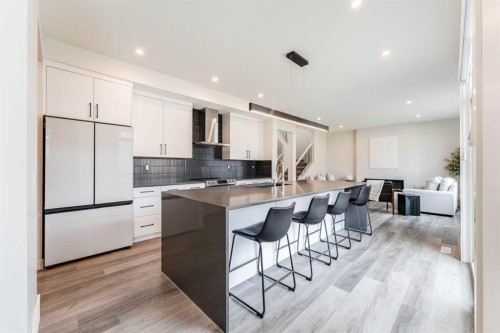 64 Waterford Terrace, Chestermere, AB - Indoor Photo Showing Kitchen With Upgraded Kitchen