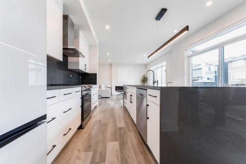 64 Waterford Terrace, Chestermere, AB - Indoor Photo Showing Kitchen With Upgraded Kitchen