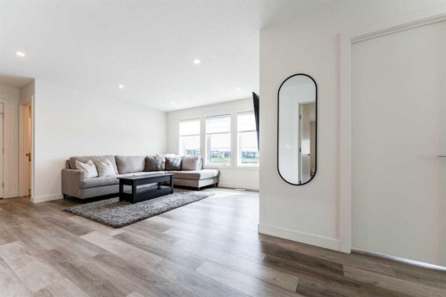 64 Waterford Terrace, Chestermere, AB - Indoor Photo Showing Living Room