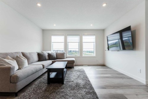 64 Waterford Terrace, Chestermere, AB - Indoor Photo Showing Living Room