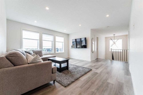 64 Waterford Terrace, Chestermere, AB - Indoor Photo Showing Living Room