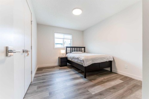 64 Waterford Terrace, Chestermere, AB - Indoor Photo Showing Bedroom