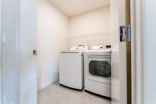 64 Waterford Terrace, Chestermere, AB - Indoor Photo Showing Laundry Room