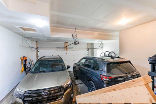 64 Waterford Terrace, Chestermere, AB - Indoor Photo Showing Garage