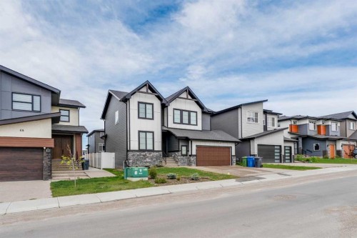 64 Waterford Terrace, Chestermere, AB - Outdoor With Facade