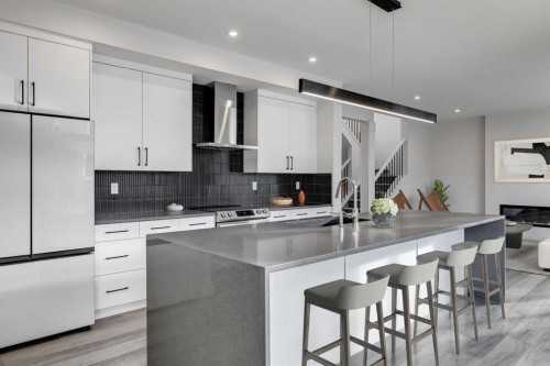 64 Waterford Terrace, Chestermere, AB - Indoor Photo Showing Kitchen With Upgraded Kitchen